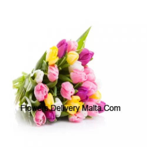 Un magnifique bouquet de tulipes de différentes couleurs avec des remplissages saisonniers - Veuillez noter que en cas de non disponibilité de certaines fleurs saisonnières, celles-ci seront remplacées par d'autres fleurs de même valeur
