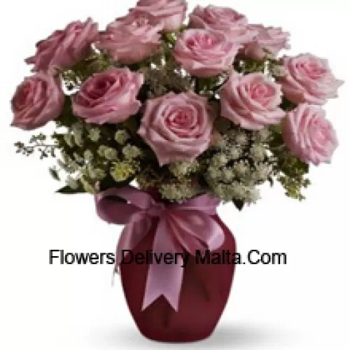 11 Pink Roses With Assorted White Fillers In A Glass Vase