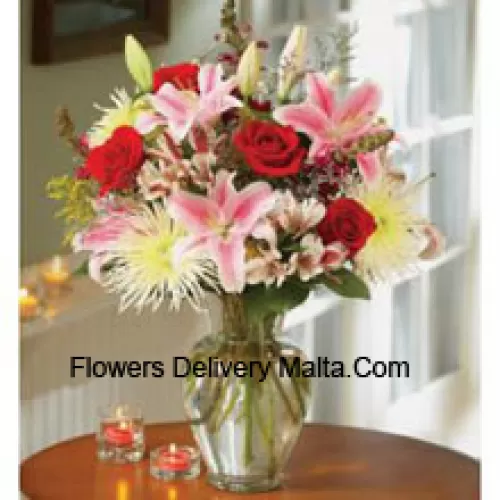 Pink Lilies And Red Roses In A Glass Vase
