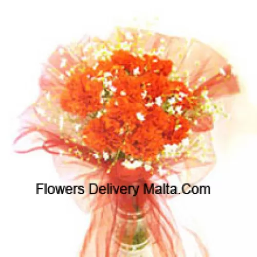 11 Orange Carnations With Some Ferns In A Vase