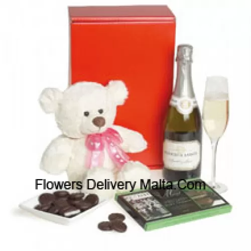 This exclusive wine hamper comes with Pierre Legendre Brut Sparkling (France) accompanied with an 8 Inches Cute White Teddy Bear And An Imported Box Of Chocolate. (Contents of basket including wine may vary by season and delivery location. In case of unavailability of a certain product we will substitute the same with a product of equal or higher value)