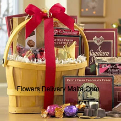 A classic combination of the finest gourmet chocolates make this a gift basket perfect for anybody that loves sweets. Includes Italian Chocolate Truffles, crunchy Almond Roca, a White Chocolate Amaretto Wafers, Chocolate Fudge, creamy rich Milk Chocolate, Belgian Chocolates, and assorted individually-wrapped Godiva Chocolates. We pack it all in a reusable handle basket and ship your gift straight to your recipients. (Please Note That We Reserve The Right To Substitute Any Product With A Suitable Product Of Equal Value In Case Of Non-Availability Of A Certain Product)